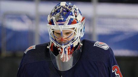 Igor Shesterkin of the Rangers looks on after