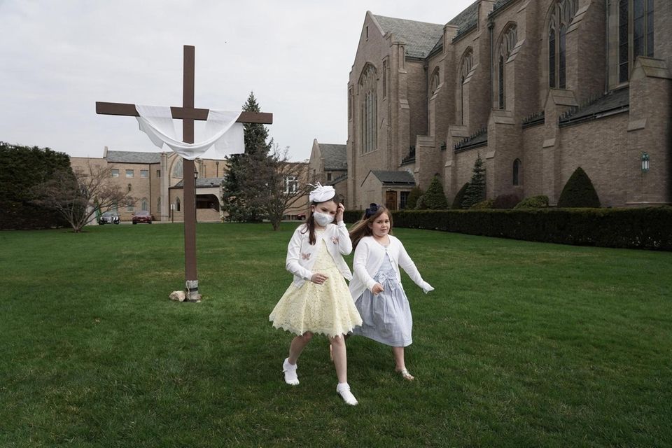 Parishioners Caroline Lennon, 8, left, and Isabella Morzillo,