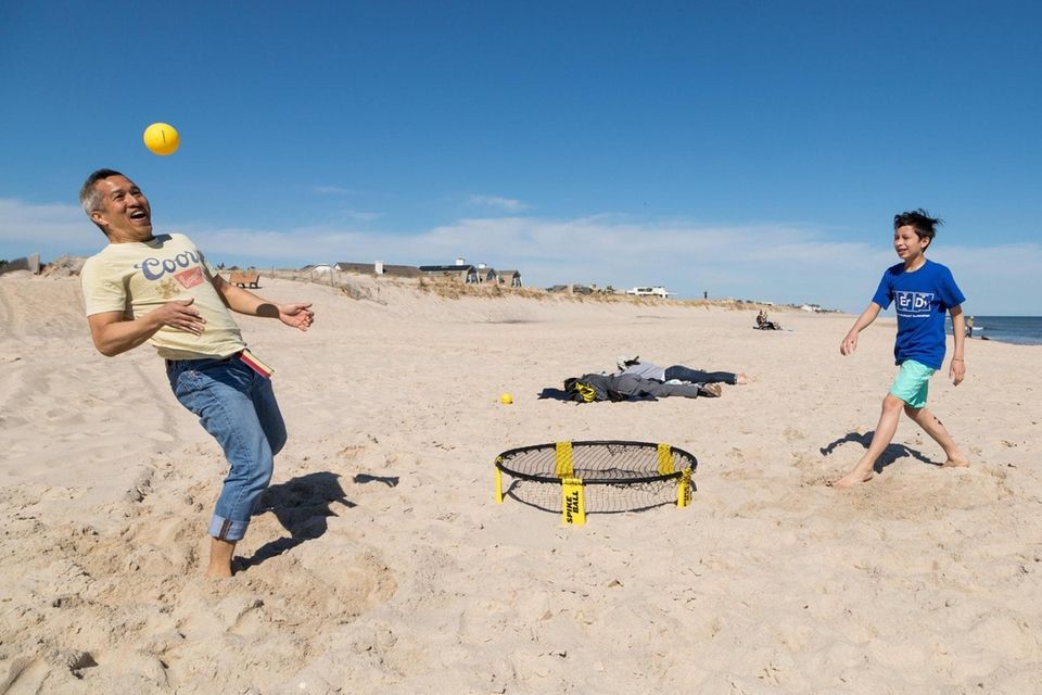 Ron Medalla of Wilton, CT, plays Spikeball with