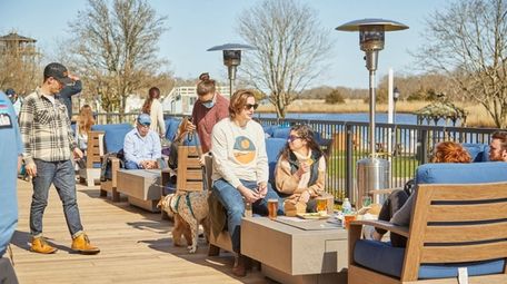 Patrons enjoy outdoor dining, Peconic County Brewing, Riverhead,