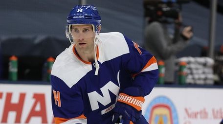 Travis Zajac #14 of the Islanders skates during