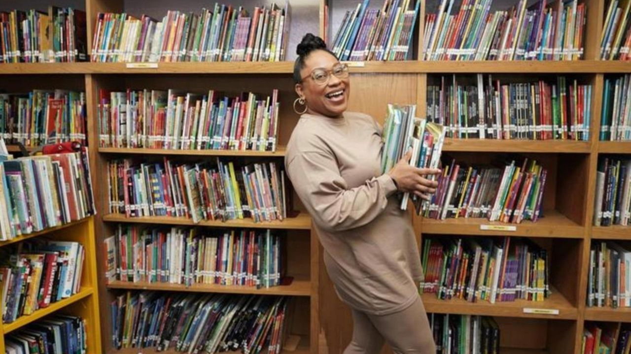 Salamah Adjoua-Mullen, Uniondale school librarian, was awarded a New