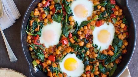 Eggs baked in chickpeas, corn, sweet potato and