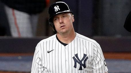 Jay Bruce of the Yankees strikes out during