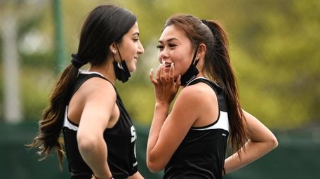 Olivia Tiegerman, left, and Alex Ho of Syosset