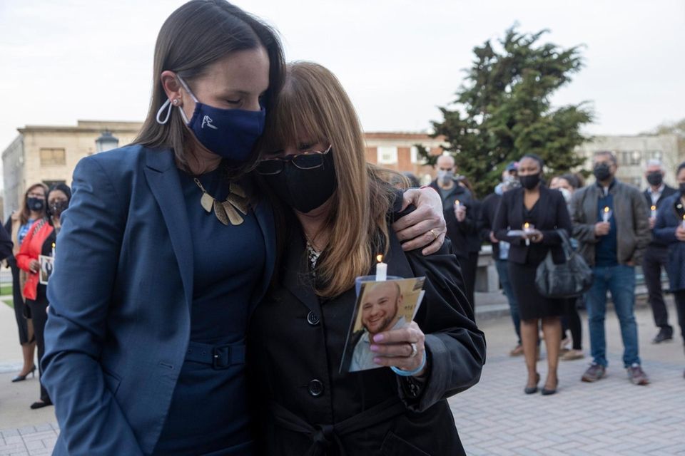 Nassau ADA Stephanie Palma hugs Lori Grabelsky as