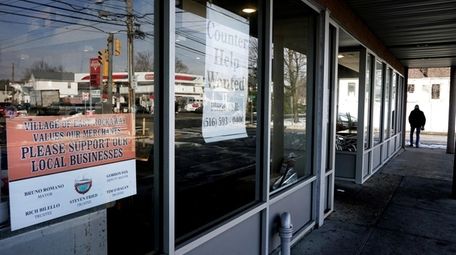 A help wanted sign is displayed in a