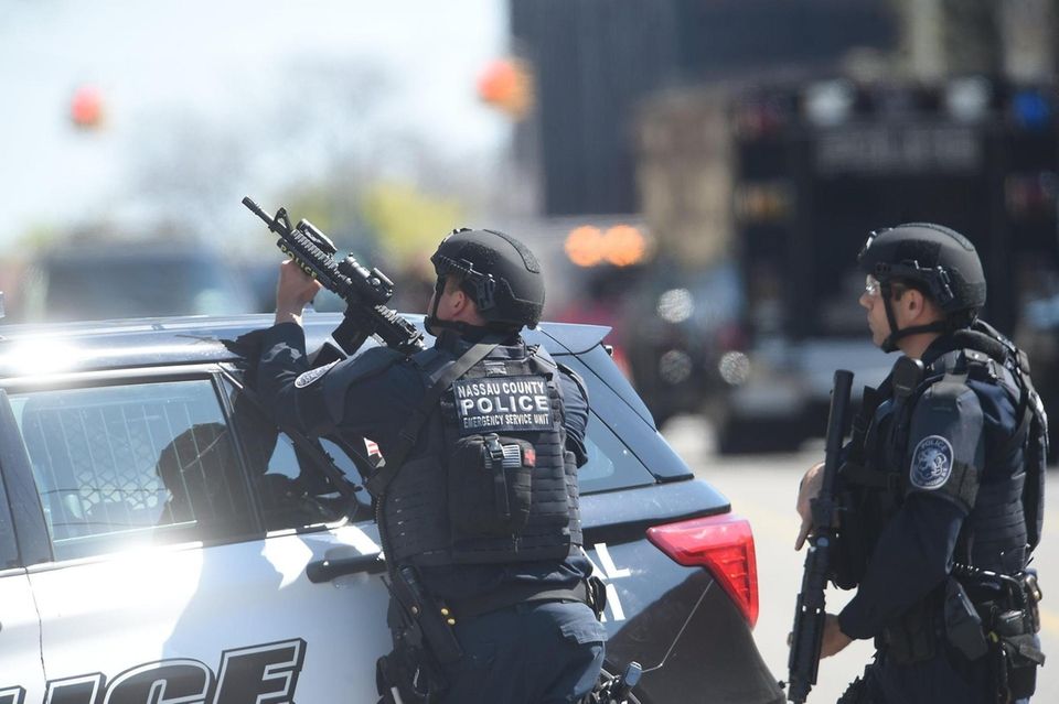 Nassau County SWAT team surround the building where