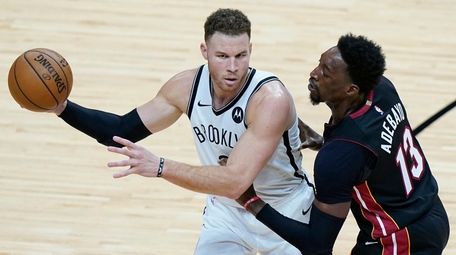 Nets forward Blake Griffin, left, looks for an