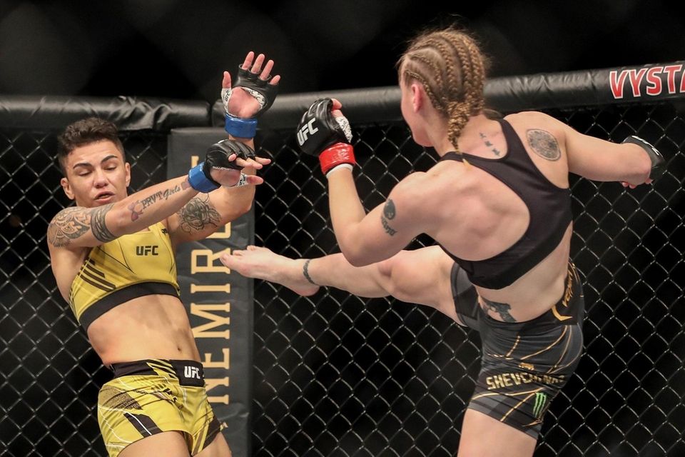 Valentina Shevchenko of Kyrgystan kicks Jessica Andrade of
