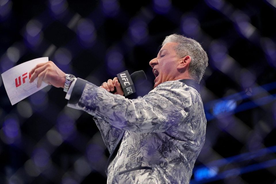 Octagon announcer Bruce Buffer announces fighters during UFC