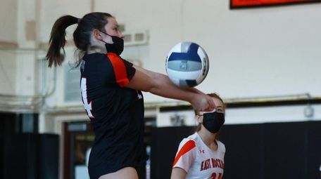 Riley O'Hagan of East Rockaway returns a serve