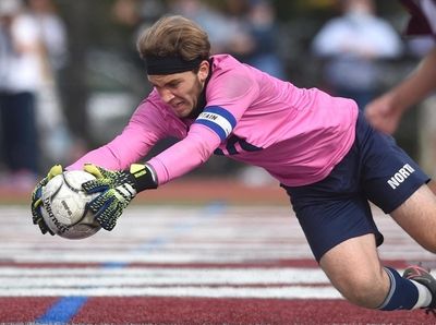 Matthew Heimowitz, Great Neck North goalie, covers the
