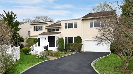 Priced at $1,339,000, this five-bedroom, five-bathroom Contemporary on