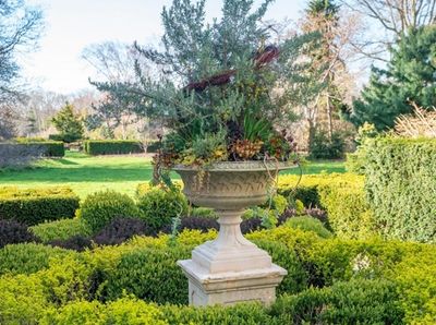 The Knot, with a Haddonstone urn planted with