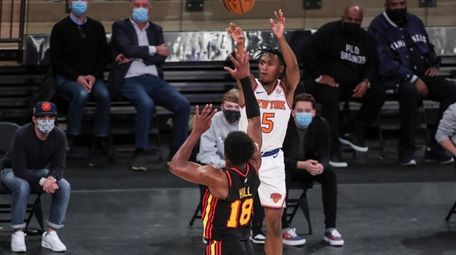 New York Knicks guard Immanuel Quickley (5) shoots