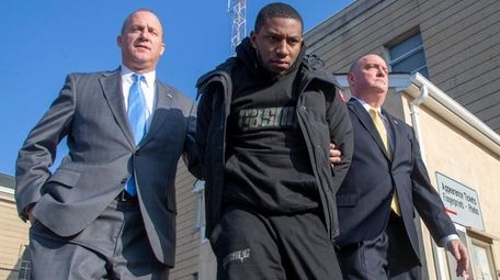 Jamik Cannon leaves Nassau County police headquarters in