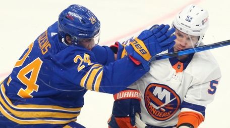 Sabres forward Dylan Cozens and Islanders forward Casey