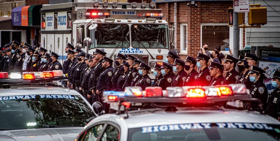 New York City Police Officers line the streets