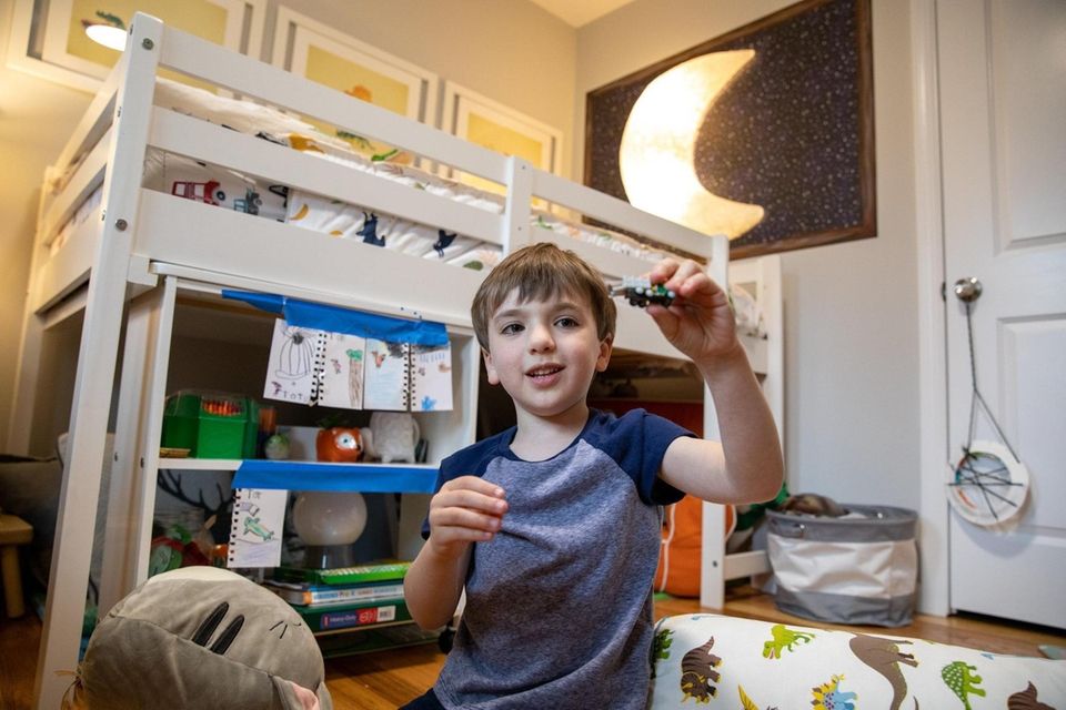 Izzy King, 5, in his room at home