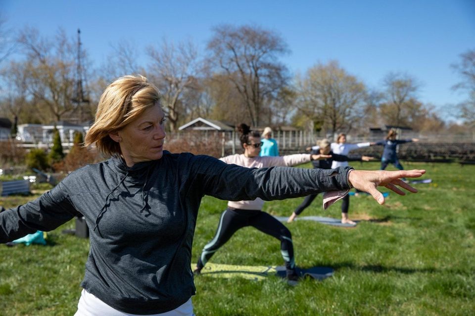 Ellen Hughese from Cutchogue does warrior two yoga