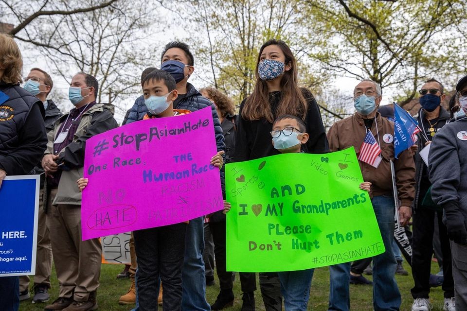 Derek Chan, left, Karen Chan, Connor Chan, 9,