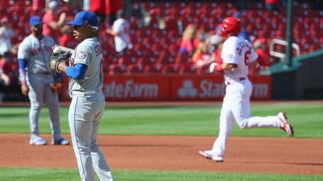 Marcus Stroman #0 of the Mets reacts after