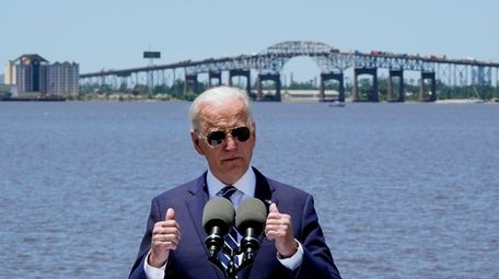 President Joe Biden speaks with the Interstate 10