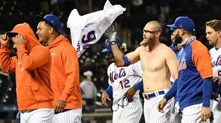 New York Mets pinch hitter Patrick Mazeika retrieves