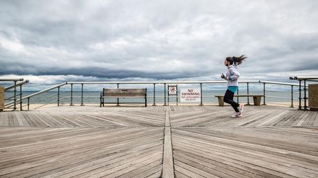 Marisa Reisinger of Queens goes for a run
