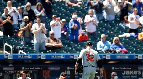 Matt Harvey of the Orioles leaves a game