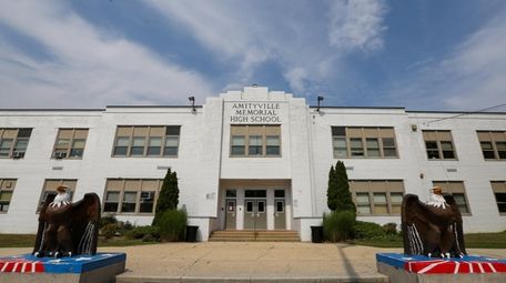 An Amityville Memorial High School teacher has been