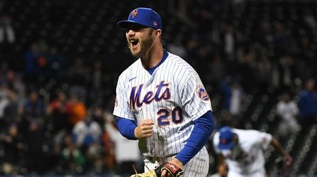 Mets first baseman Pete Alonso reacts after tagging