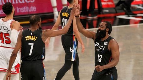 Kevin Durant #7 and James Harden #13 of
