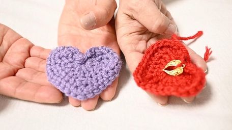 Knitted hearts by members of the Bay Shore