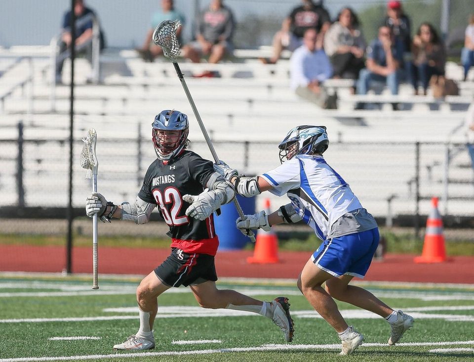 Mt Sinai's Nick Colantonio (32) looks to get