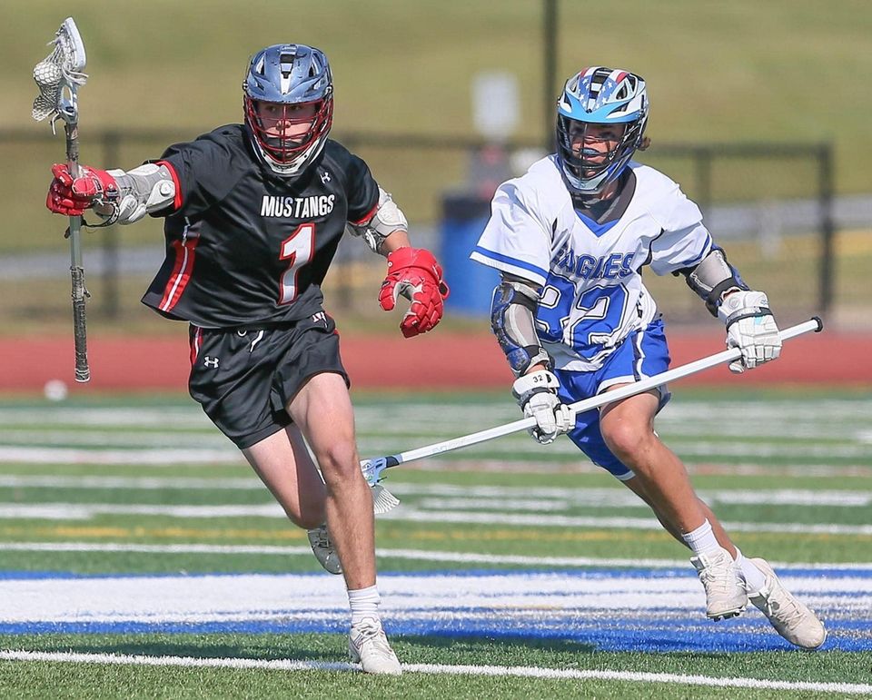 Mt Sinai's Jake Spallina (1) carries the ball