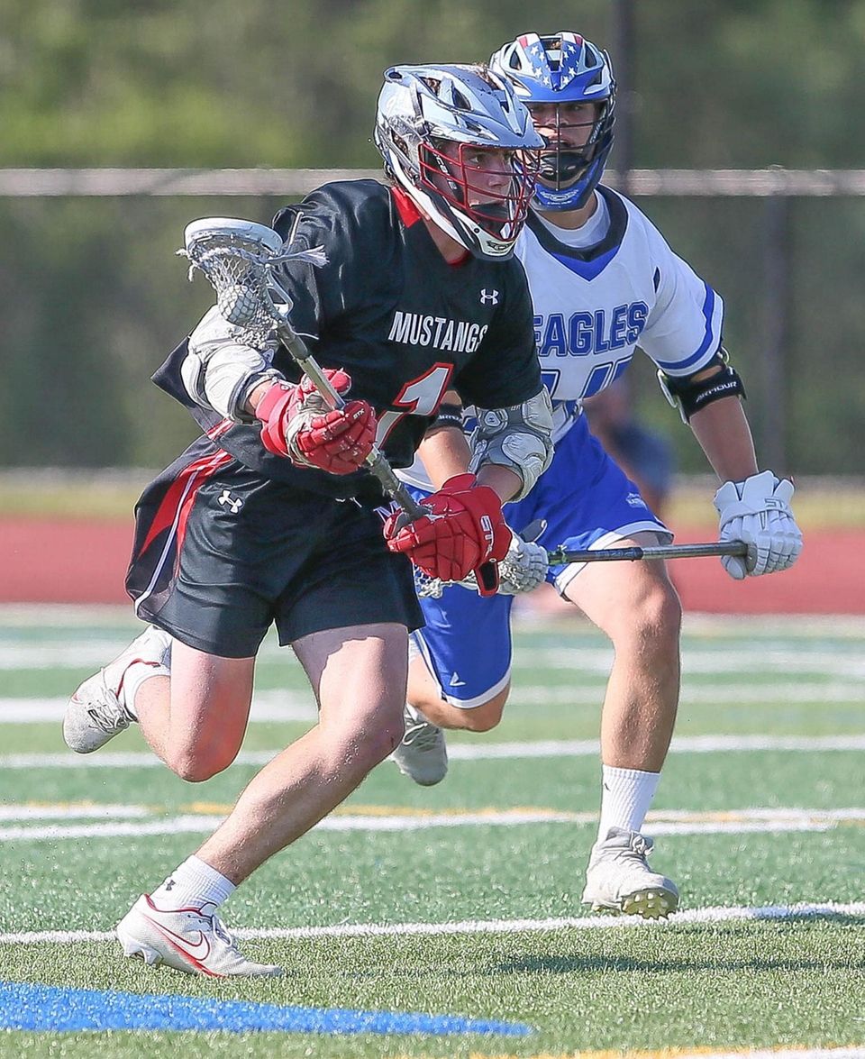 Mt Sinai's Jake Spallina (1) gets by Hauppauge's