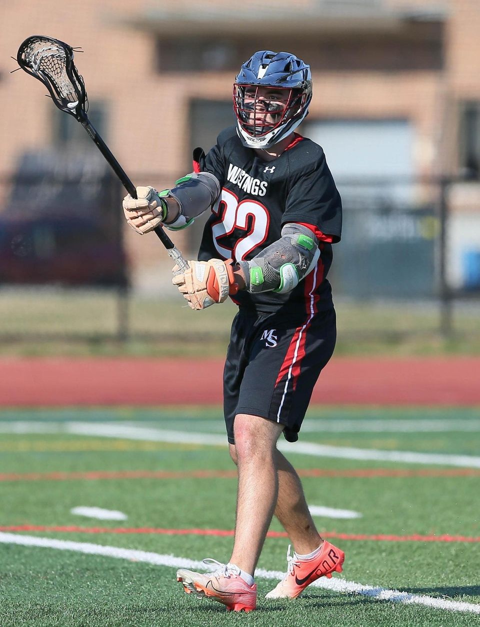 Mt Sinai's Joey Spallina (22) makes a pass