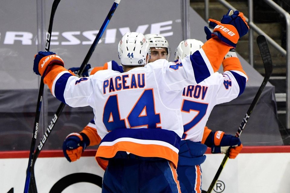 Jean-Gabriel Pageau #44 and Leo Komarov #47 celebrate