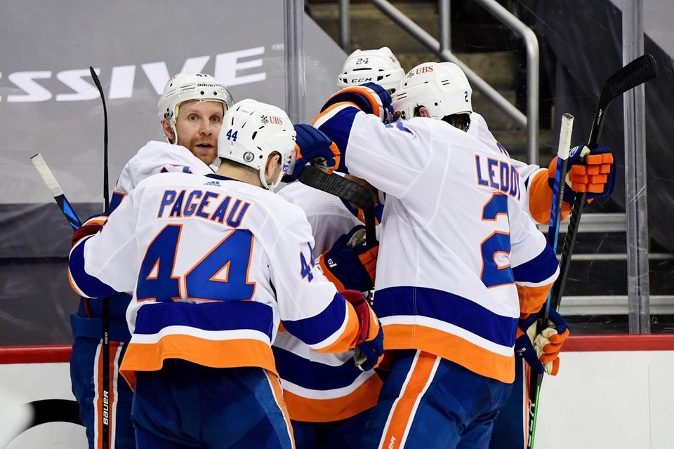 The New York Islanders celebrate a goal by