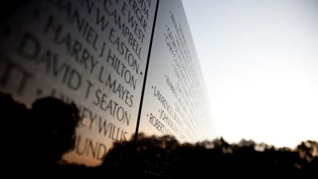 The Vietnam Veterans Memorial Wall is seen as