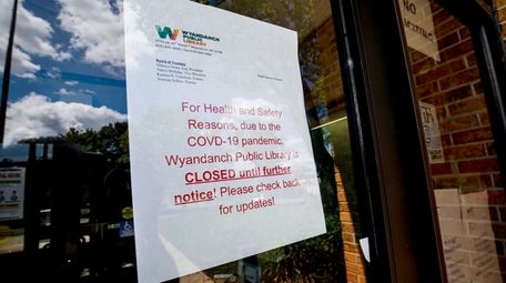 A sign posted on the door of the