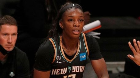 Michaela Onyenwere of the Liberty controls the ball