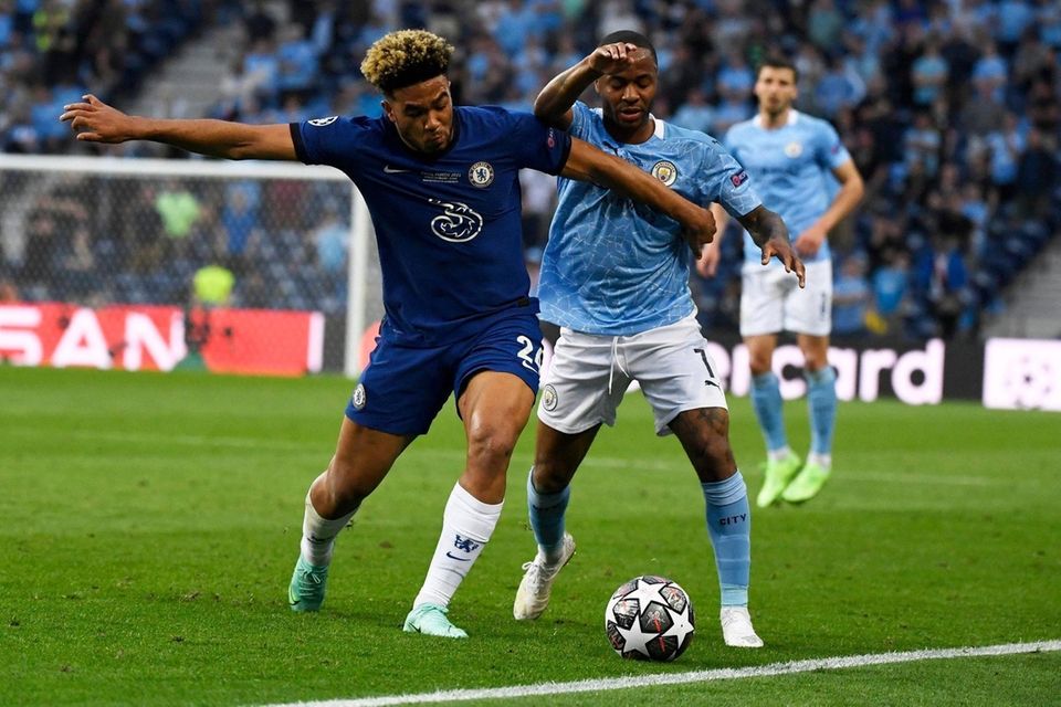 Chelsea's Reece James, left, fights for the ball