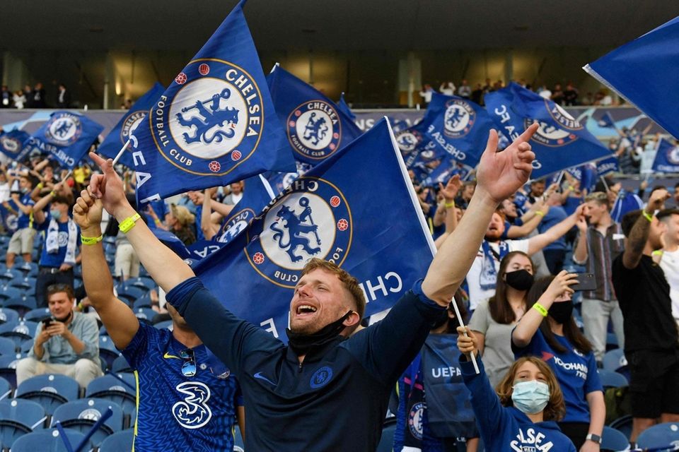 Chelsea fans cheer ahead of the UEFA Champions