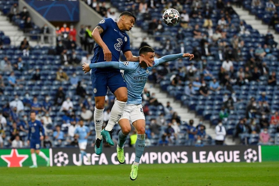 Chelsea's Thiago Silva jumps for the ball with