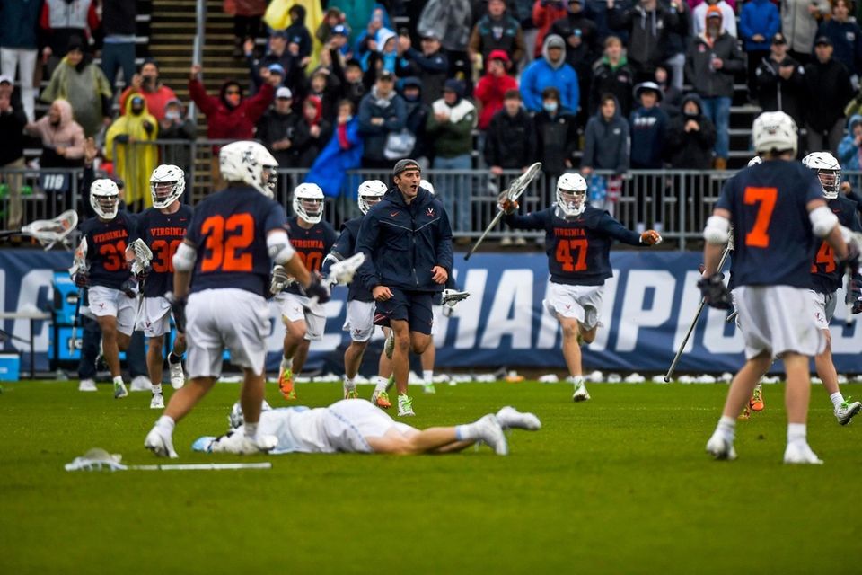 Virginia players celebrate after they defeated North Carolina