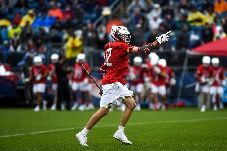Maryland's Logan Wisnauskas (12) celebrates a goal against