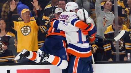 Casey Cizikas #53 and the Islanders celebrate his